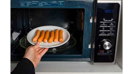 Are you looking for an easier and faster way to cook sausages? If your answer to this question is yes, simply checkout the article below in order to learn how you can use the microwave to cook sausages. How To Cook Sausages In The Microwave Before we dive into giving you instructions on how to cook sausages in the microwave, it’s important to know that sausages that are cooked in a microwave are never crispy and they are most likely to lose their outer skin. So if you do not mind simply follow the steps below. Step 1 When using the microwave to cook sausage, the first thing you need to do is to separate the sausages especially if they are joined as links. Step 2 Take a microwave safe plate or dish and then line the sausages inside. Prick the sausages using a fork so that during the cooking process, steam can escape thus, preventing the sausages from bursting. Step 3 Cover the plate or bowl with a kitchen towel or a lid and then place them in the microwave. Cook them on high heat for about 2 minutes. Step 4 After the 2 minute time mark, open the microwave and turn over the sausages. Let them cook for another 2 minutes before opening up the microwave. Step 5 Once the sausages are ready, the outer skin would have peeled away so you can easily remove it and place it in the bin. In order to be certain whether your sausages are ready check their color. They should have light brown color and not a pink color. Advantages Of Cooking Sausages In The Microwave • It’s actually one of the fastest and easiest ways to cook sausages. • It’s a messy free method when compared to the stovetop method. • There is no need for you to babysit the sausages as they cook. Disadvantages Of Cooking Sausages In The Microwave • There is a huge risk that the sausages will burst when they are not pricked. • Sausages cooked in the microwave are never crispy because the microwave releases an intense amount of heat. Other Methods For Cooking Sausages Stovetop Method NB: this is also one of best ways to cook sausages since it leaves the sausages nice and crispy on the outside but soft in the inside. Step 1 When using the stovetop to cook sausages the first thing that you need to do is take a frying pan and place it on a stovetop that is switched on to medium heat. Step 2 Add a bit of oil to the pan. This will help to prevent the sausages from sticking to the bottom. Step 3 When the oil has heated up, take the sausages and place them inside the frying pan. Cook them for 6 to 8 minutes or until they are nice and golden brown. Step 4 Once they are completely cooked, remove them from the pan and let them cool down before serving them. Disadvantages Of Using The Stove Method • It is a very messy method because oil can splutter all over the stove top. • There is need to babysit the sausages or else they will burn. Air Fryer Method NB: this methods leaves the sausages nice and crispy on the outside. Step 1 Take your sausages and prick them using a fork or a knife. This will help the sausages to release more fat once they start cooking. Step 2 Take you sausages and place them in the air fryer basket. Set the air fryer to 350F and let the sausages cook for about 10 to 15 minutes. You should turn the sausages after every 5 minutes so that they can cook evenly on both sides. Step 3 When the sausages are ready, remove them from the air fryer and then serve. Disadvantages Of Using The Air Fryer • Turning the sausages after every 5 minutes can become a boring task. Oven Method NB: this method can be used to cook large amounts of sausages. Step 1 When using the oven to cook sausages, the first thing you need to do is to preheat the oven to 350F. Step 2 Take a baking tray and then line it with parchment paper so that the sausages do not stick to the bottom of the pan. Step 3 Place the sausages on top of the parchment paper making sure that they are not overcrowded. Step 4 Place the baking tray into the oven and let the sausages cook for about 15 minutes. Step 5 After the 15 minute time mark, you should flip the sausages and cook them for another 15 minutes. Step 6 When the sausages are ready, remove them from the oven and let them cool down before serving. Grill Method NB: there is a risk that the sausages will burn when using this method, so make sure you keep a close eye on them. Step 1 When using the grill to cook sausages, the first thing you need to do is to preheat the grill to 450F. Step 2 Take your sausages and prick them using a fork. This will help to ensure that they release fat as they cook. Step 3 Place the sausages on the grill and let them cook for 4 to 6 minutes on one side. Step 4 Turn the sausages over and let the other side cook for another 4 to 6 minutes. Step 5 When the sausages are ready, use a thermometer to check their internal temperature. It should read 165F. How Long Should Raw Sausage Be Cooked? Raw sausage should be cooked until the internal temperature reads 165F. This is because bacteria usually affects meat that is below this temperature range and the only way to kill them is to cook food until it has reached 165F. Conclusion There are various methods that can be used to cook sausages however, the microwave seems to be one of the fastest ways to do so. It is important to remember that sausages need to be cooked until they reach an internal temperature of 165F.